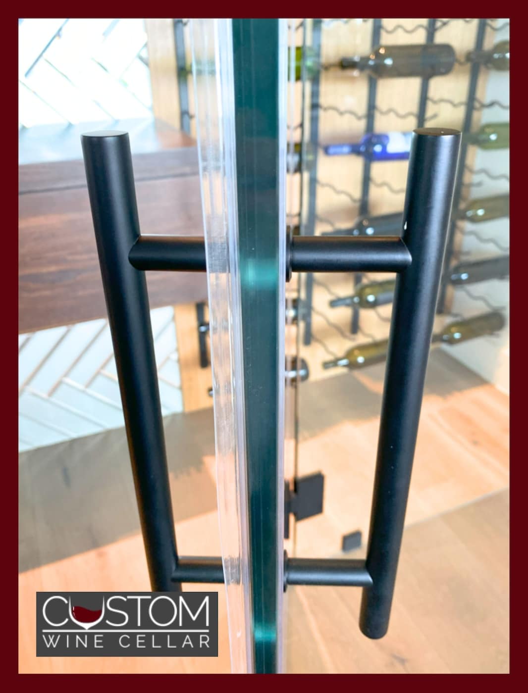 Rubber weather stripping around the edges of a wine cellar glass door