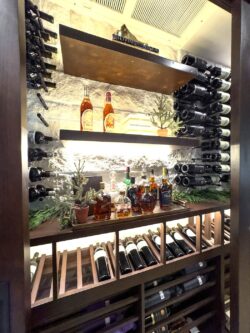 43 - A place for everything is what this glass wine cellar is!