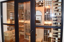 Glass Wine Room Doors with Wooden Wine Racking Inside