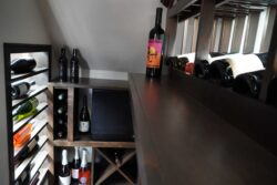 7 - Rustic Wooden Wine Racks Built for a Custom Wine Cellar Rustic Wooden Wine Racks