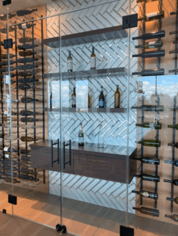 9 - Frameless Glass Wine Cellar Door in Dana Point. Frameless Glass Wine Cellar Door in Dana Point.