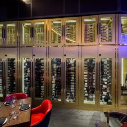 2 - Our wine cellar design for this restaurant involved triple deep metal wine racks. luxurious wine cellar design in an Orange County Restaurant