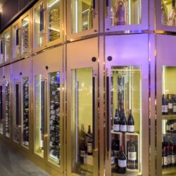 4 - For this restaurant wine cellar design, the plan was to store champagnes on the upper part of the display. In this restaurant wine cellar design, champagnes are stored on the upper sections.