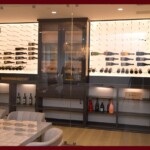 Frameless glass wine room panels subtly integrate your wine cellar with the adjacent room. Custom frameless glass wine cellar doors for a wine room and cigar humidor