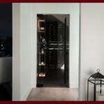 Tinting frameless glass wine cellar doors can provide additional security to your modern wine cellar.