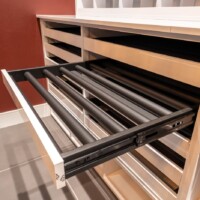 Here's a closer look at this custom modern wine room's drawers.