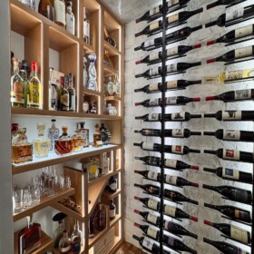 Lighting plays a very important role in creating a more characteristic modern wine display.