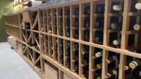 (8) There's a place for everything in this modern wine cellar rack, including a space for wine boxes!