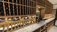 (10) All the wooden parts in this modern glass wine cellar are white oak, polished with lacquer for a smooth, clean finish.