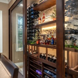 (3) A glass dining room wine cellar that fits either a casual dining experience or a fine dining ocassion.