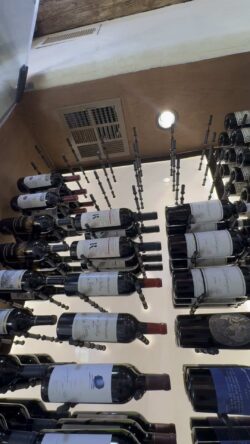 Why build out when you can build up? This vertical wall wine cellar maximizes every inch.