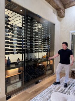 This living room wall wine cellar adds sophistication without sacrificing comfort.