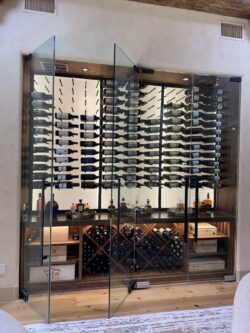 This illuminated wall wine cellar turns an ordinary wall into a wine lover’s dream.