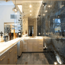 (11) The bar area stands out with the help marble backwall and alabaster countertops