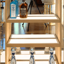 (4) White acrylic panels serve as our shelves, a great upgrade from the traditional wooden shelves.